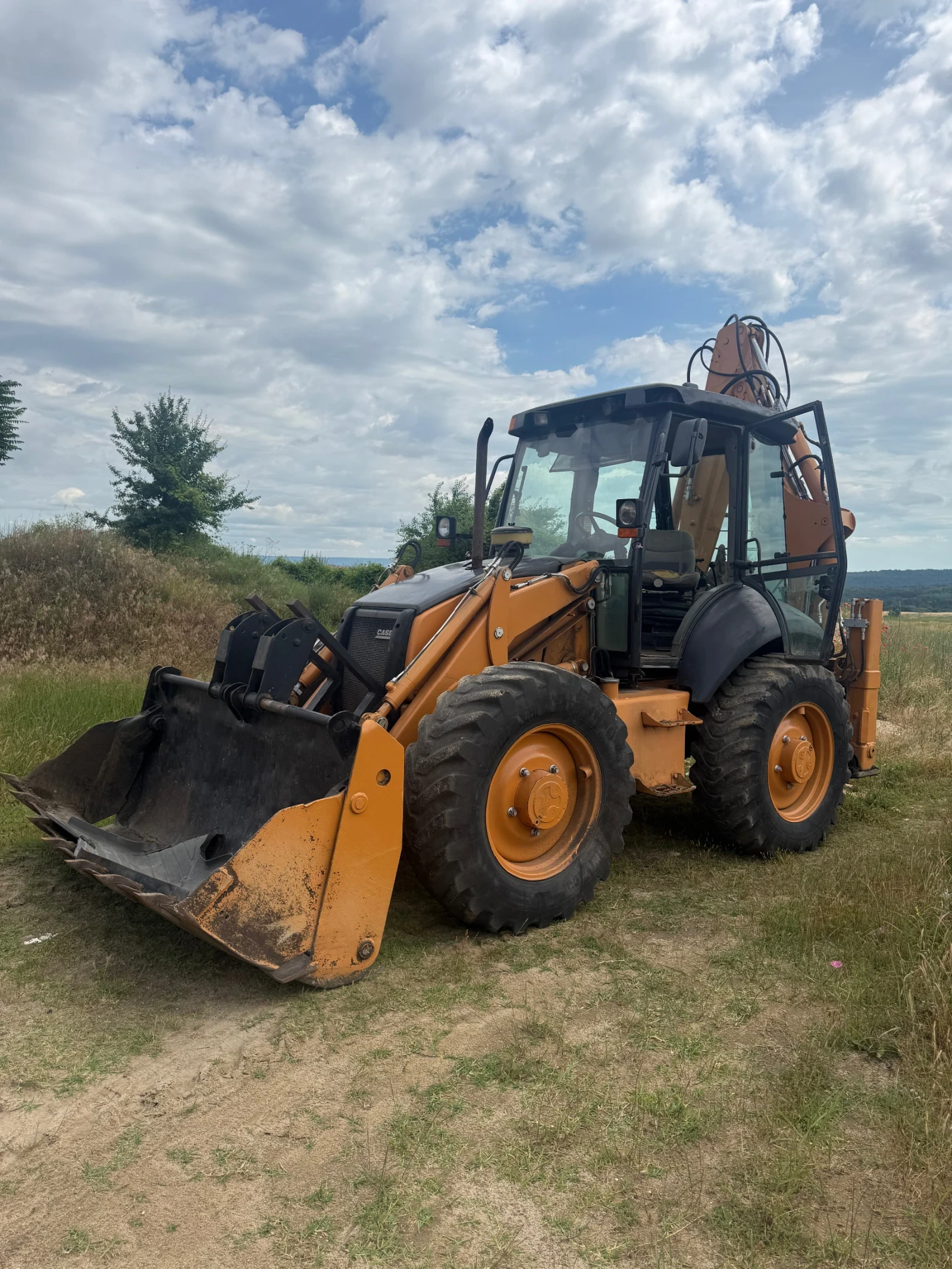 Багер Case Super 695