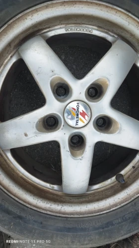        195/55R15  Mazda 626