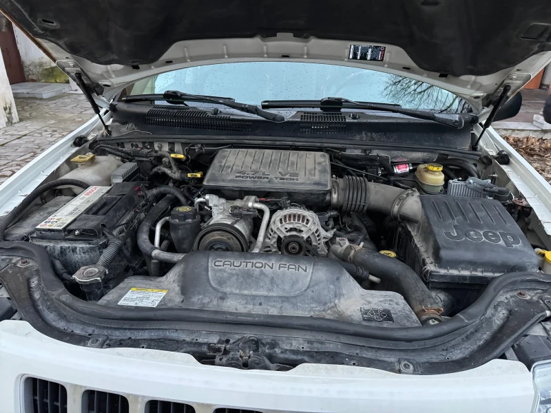 Jeep Grand cherokee 4.7 Quadra Drive, снимка 11 - Автомобили и джипове - 52966928