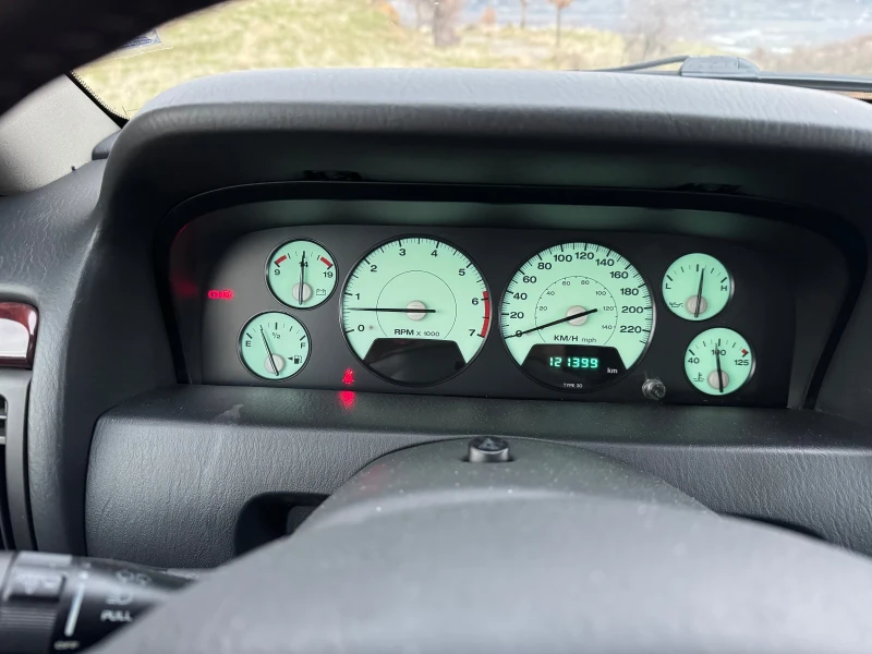 Jeep Grand cherokee 4.7 Quadra Drive, снимка 8 - Автомобили и джипове - 52966928