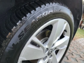 Opel Astra 1.4 / Фабрична газ / 140кс. , снимка 16