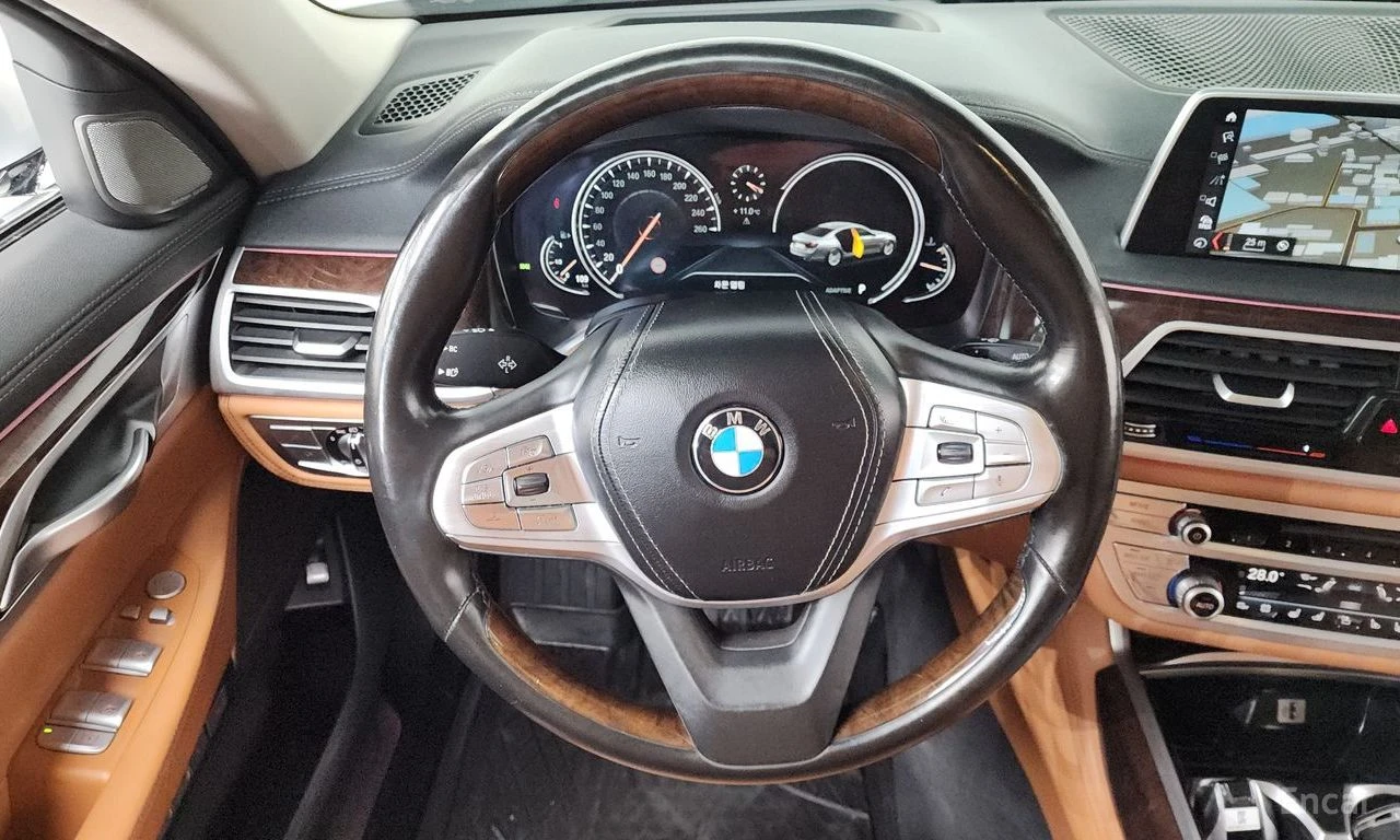 BMW 740 * ФИКСИРАНА ЦЕНА ДО БЪЛГАРИЯ * АВТОКРЕДИТ, снимка 14 - Автомобили и джипове - 55452383