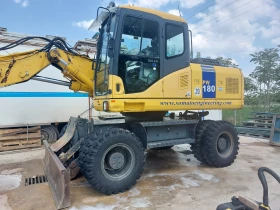 Багер Komatsu PW180