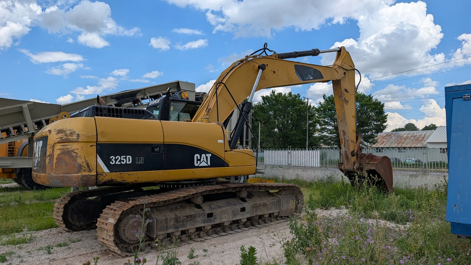 Багер Caterpillar 325D