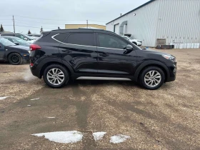 Hyundai Tucson LUXURY/CARFAX/Панорама/Кожа/Подгрев - 11500 € / 22492.04 лв. - 90374510 4