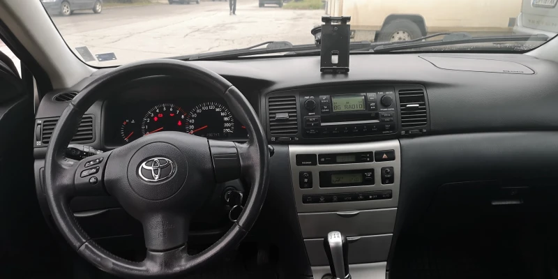 Toyota Corolla 1.6 VVI бензин + газ, снимка 10 - Автомобили и джипове - 48279124