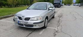 ������ Nissan Almera
