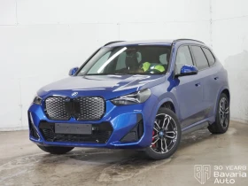 BMW iX1 30 xDrive, снимка 1