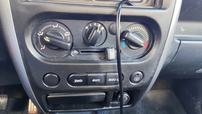 Suzuki Jimny 1.3i 4x4 Германия , снимка 8 - Автомобили и джипове - 52966219