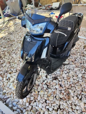     Kymco People S