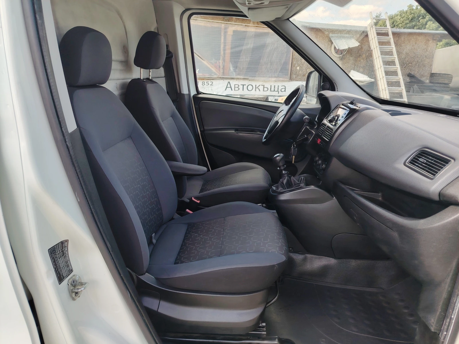 Fiat Doblo 1.6d 105кс. 6ск., снимка 13 - Автомобили и джипове - 54648558