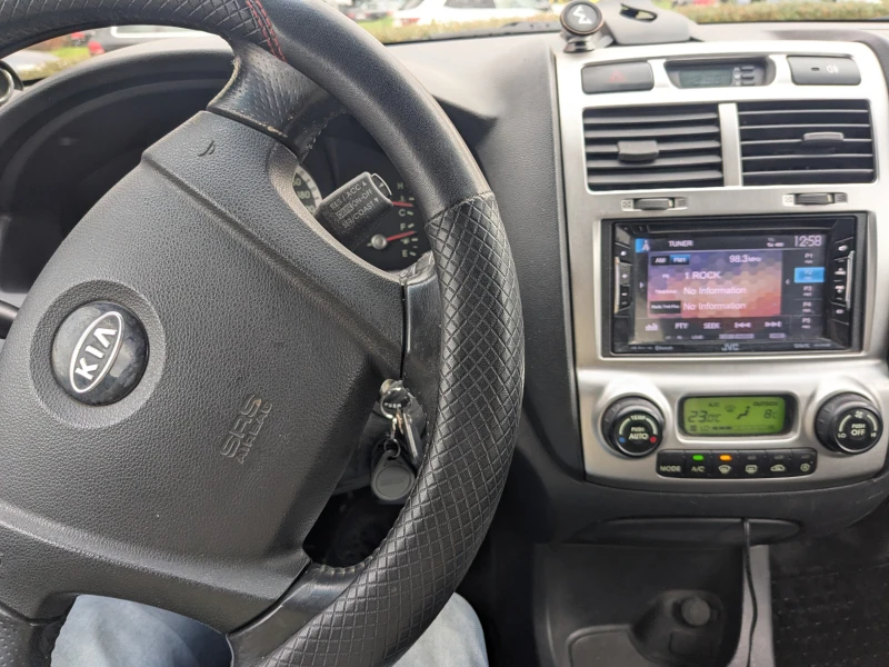Kia Sportage, снимка 10 - Автомобили и джипове - 52553004