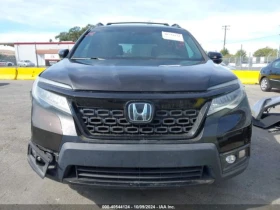     Honda Passport AWD ELITE