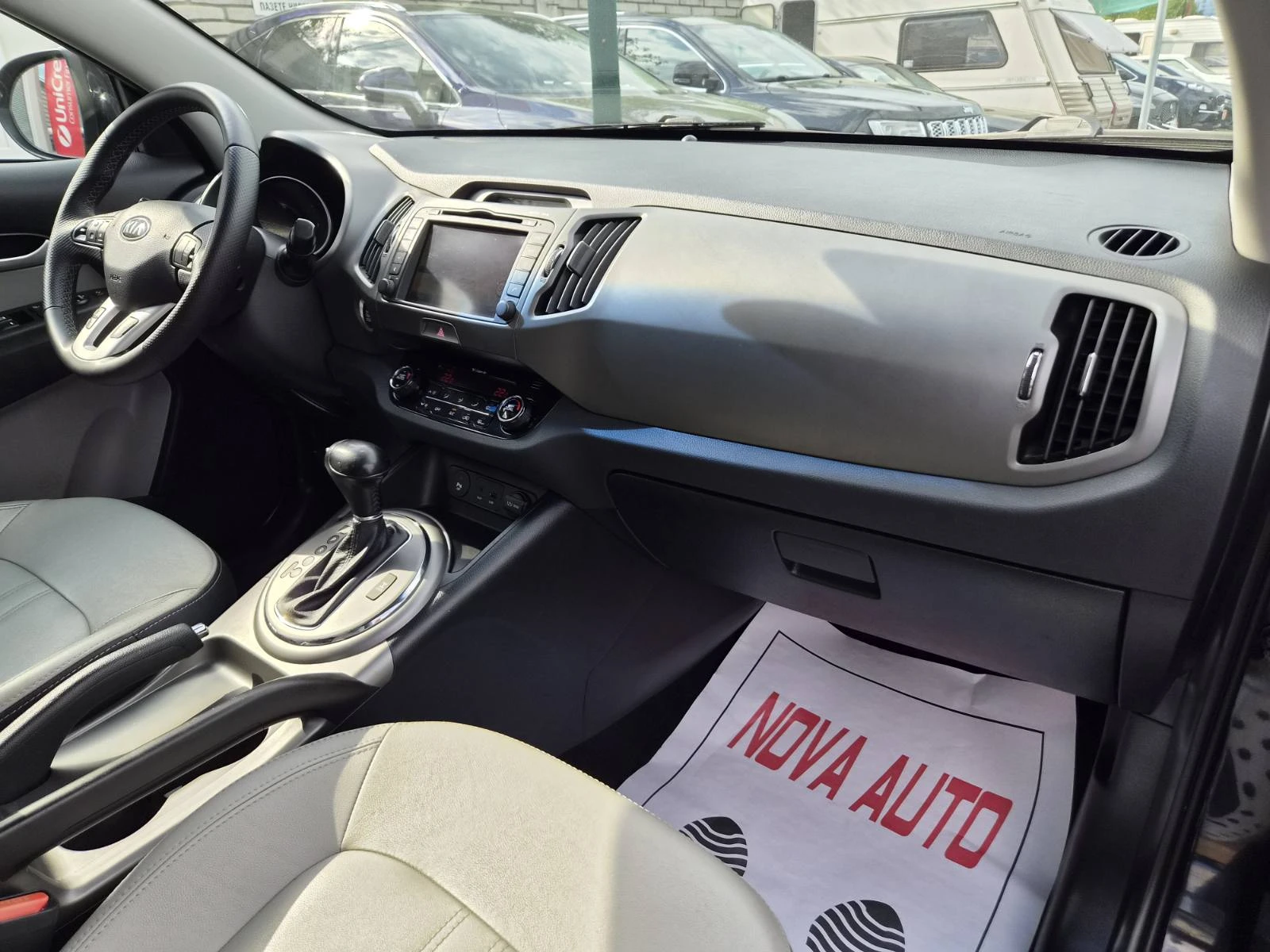 Kia Sportage 2.0D-4×4-AUTOMATIC-REBEL-ПАНОРАМА, снимка 12 - Автомобили и джипове - 56169321
