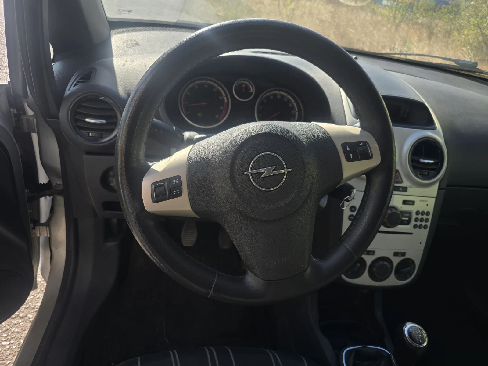Opel Corsa 1.2i, снимка 9 - Автомобили и джипове - 56655396