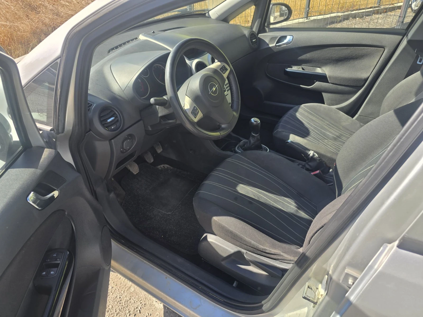 Opel Corsa 1.2i, снимка 7 - Автомобили и джипове - 56655396