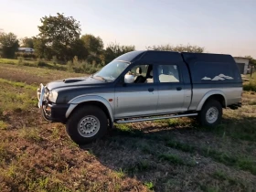 Mitsubishi L200, снимка 1