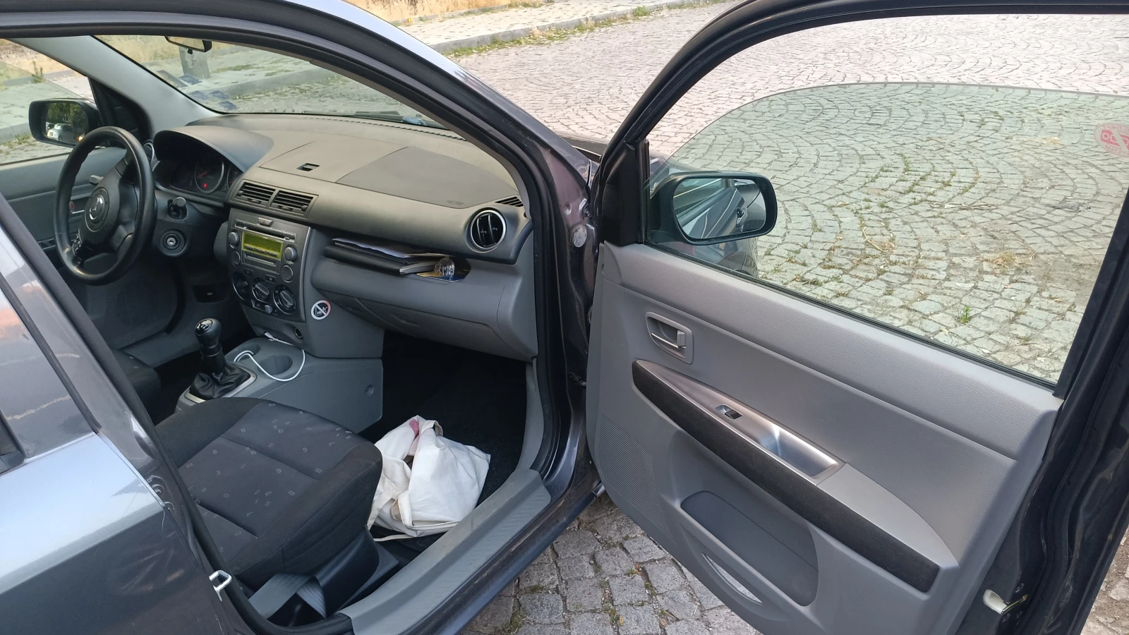 Mazda 2  - изображение 8
