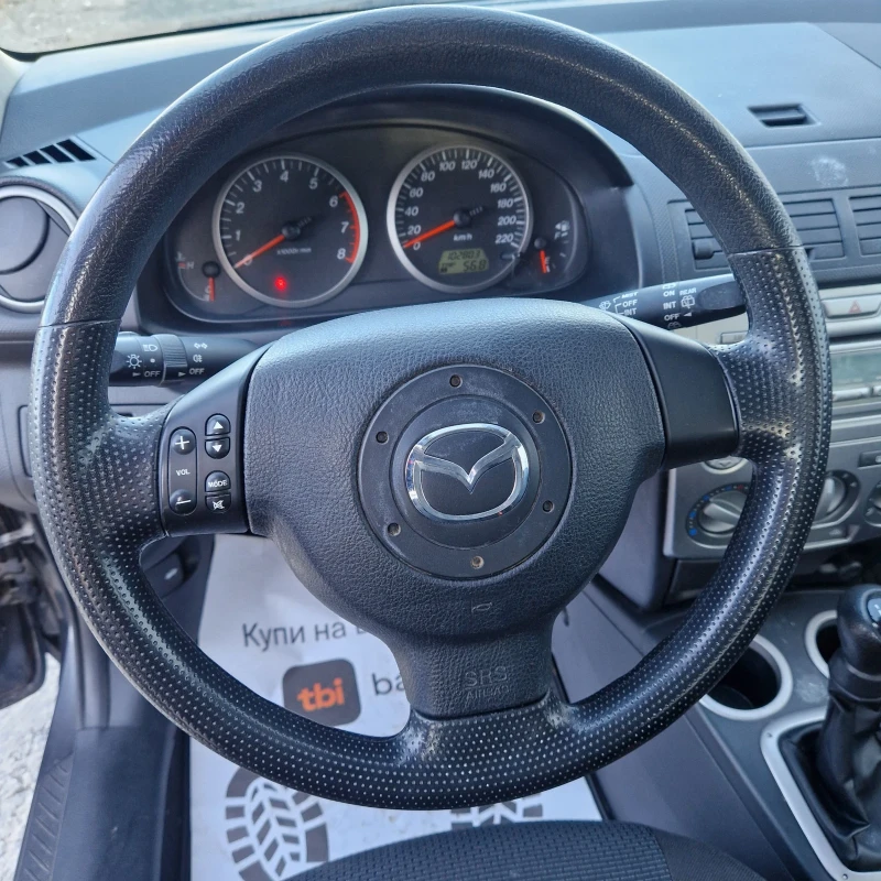 Mazda 2 1.3i FaceLift, снимка 9 - Автомобили и джипове - 48498772