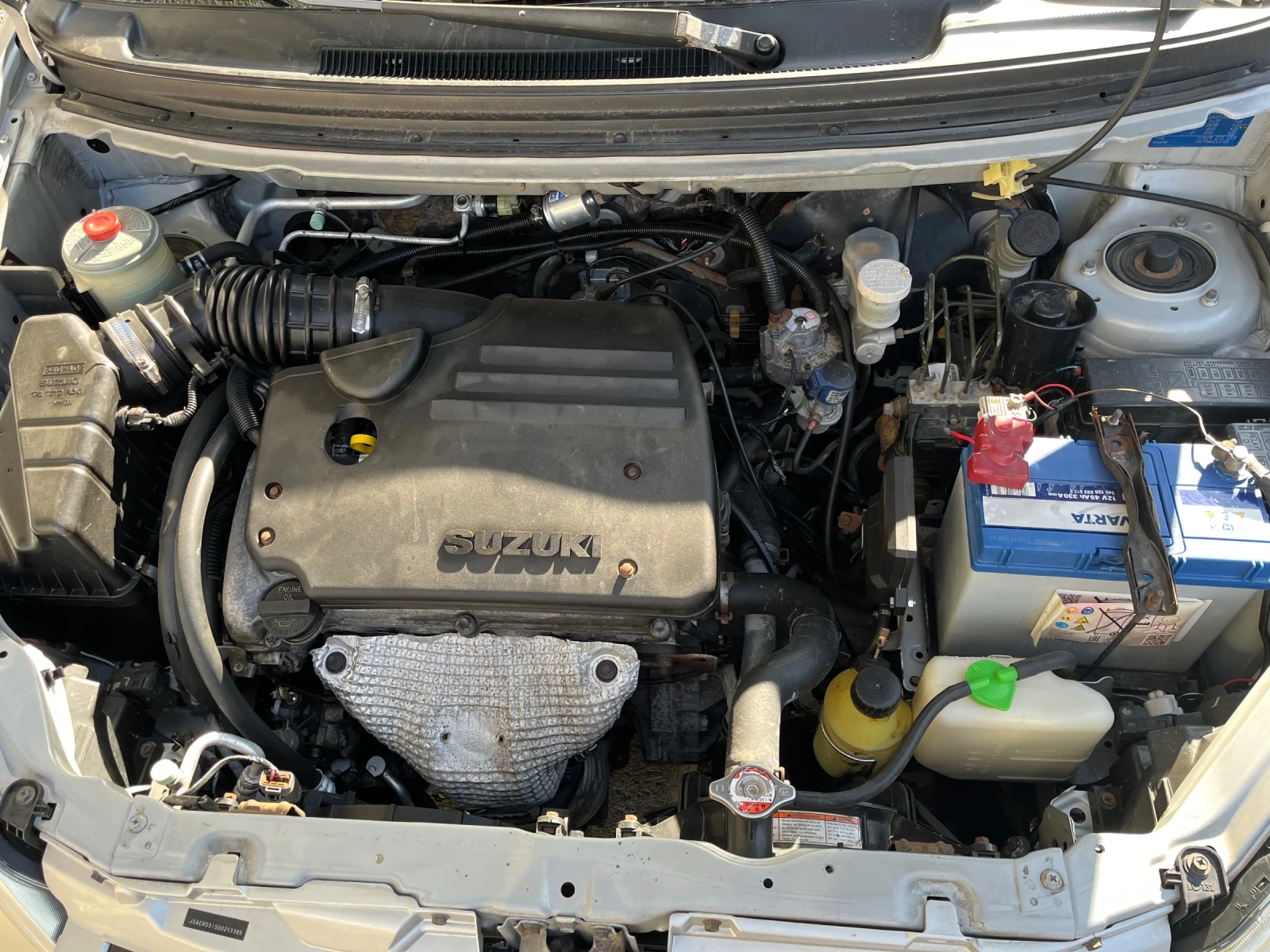 Suzuki Liana, снимка 8 - Автомобили и джипове - 53847787