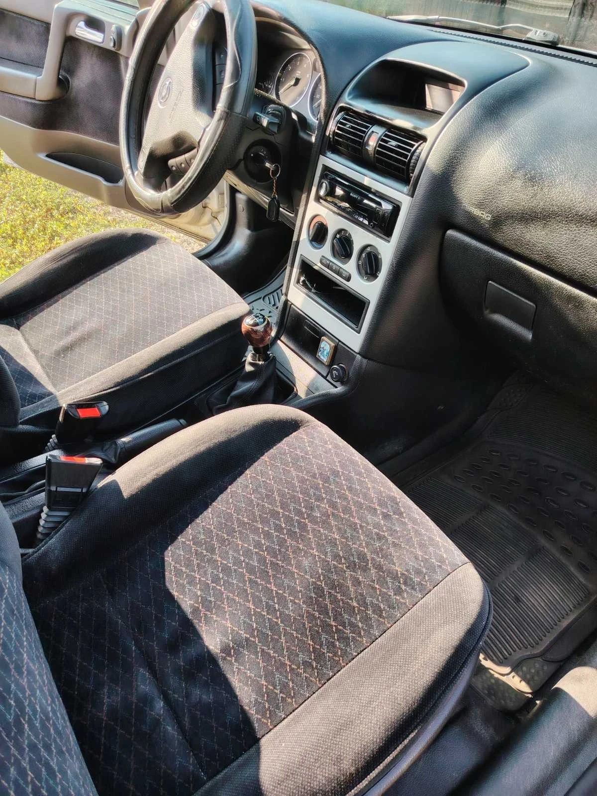 Opel Astra, снимка 12 - Автомобили и джипове - 54657798