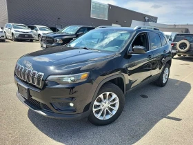 ������ Jeep Cherokee