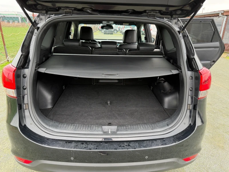 Kia Carens 1.7, снимка 13 - Автомобили и джипове - 53442740