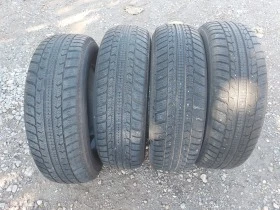 Гуми Зимни 185/70R14, снимка 1 - Гуми и джанти - 38467586