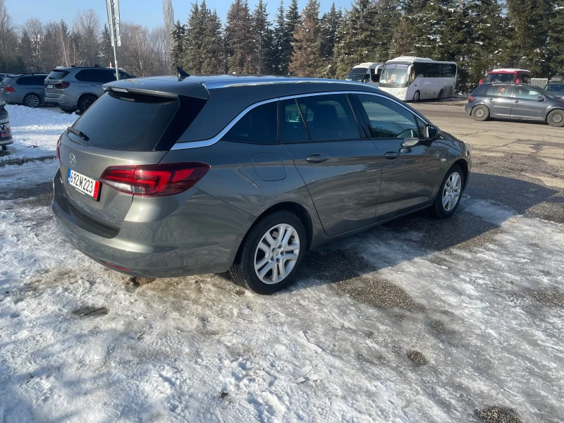 Opel Astra Sports Tourer + Xenon + Led, снимка 3 - Автомобили и джипове - 48740228