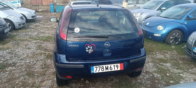 Opel Corsa 1.0 КЛИМАТРОНИК, снимка 4 - Автомобили и джипове - 52334066