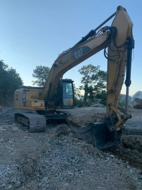 Багер Caterpillar 323FL, снимка 5