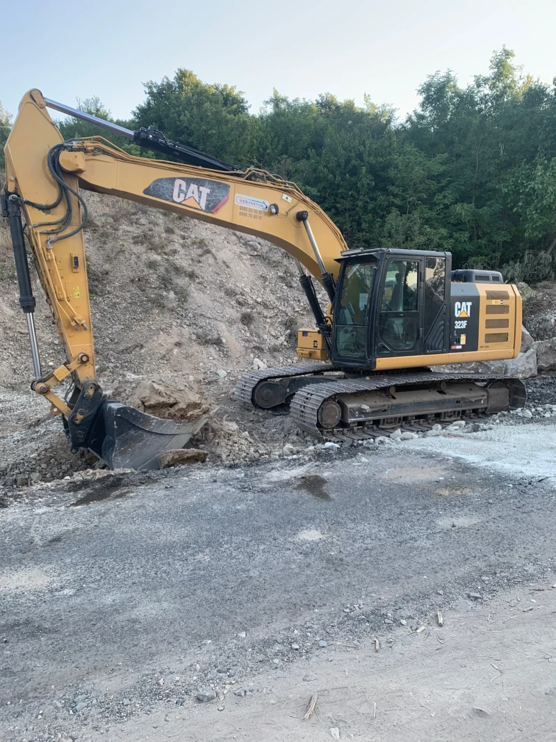 Багер Caterpillar 323FL