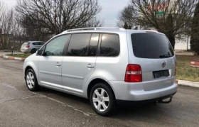 Обява за продажба на VW Touran 2.0TDI R-LINE DSG 7 МЕСТА КОЖЕН САЛОН  ~6 930 лв. - изображение 4 | Auto.bg Обява за продажба на VW Touran 2.0TDI R-LINE DSG 7 МЕСТА КОЖЕН САЛОН  ~6 930 лв. - изображение 4