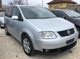 Обява за продажба на VW Touran 2.0TDI R-LINE DSG 7 МЕСТА КОЖЕН САЛОН  ~6 930 лв. - изображение 3 | Auto.bg Обява за продажба на VW Touran 2.0TDI R-LINE DSG 7 МЕСТА КОЖЕН САЛОН  ~6 930 лв. - изображение 3