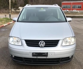 Обява за продажба на VW Touran 2.0TDI R-LINE DSG 7 МЕСТА КОЖЕН САЛОН  ~6 930 лв. - изображение 2 | Auto.bg Обява за продажба на VW Touran 2.0TDI R-LINE DSG 7 МЕСТА КОЖЕН САЛОН  ~6 930 лв. - изображение 2