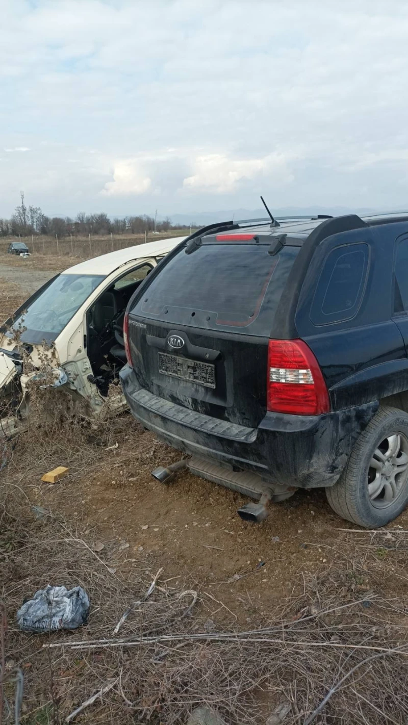 Kia Sportage 2.0D, снимка 4 - Автомобили и джипове - 49316279