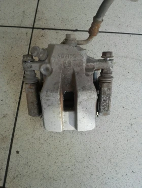 Спирачен апарат заден ляв Тойота Рав4 2.0Б 07г.