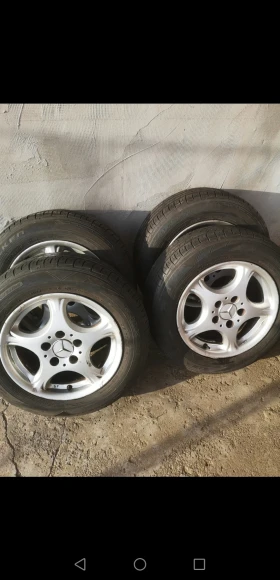 Гуми с джанти Falken 195/65R15, снимка 1 - Гуми и джанти - 49488017