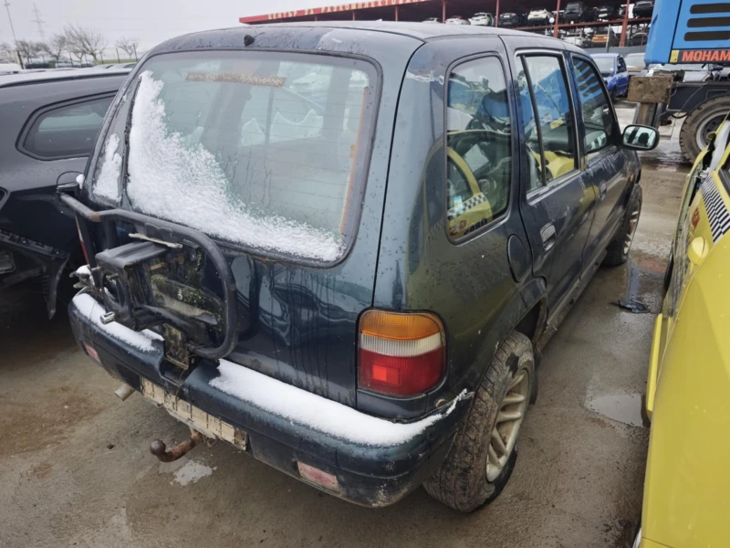 Kia Sportage 2.0, снимка 4 - Автомобили и джипове - 53520853