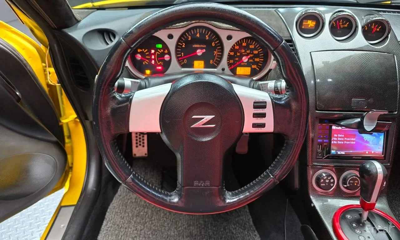 Nissan 350z * 3.5 Roadster * КРАЙНА ЦЕНА ДО БЪЛГАРИЯ, снимка 12 - Автомобили и джипове - 55834388
