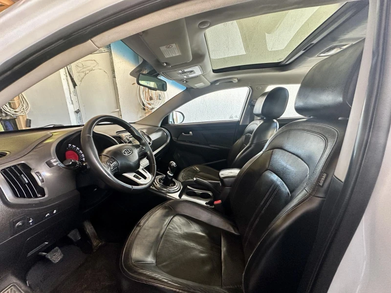 Kia Sportage 1.7 CRDi 115кс, Панорама, Кожа, Подгреви, TV, снимка 13 - Автомобили и джипове - 52465900