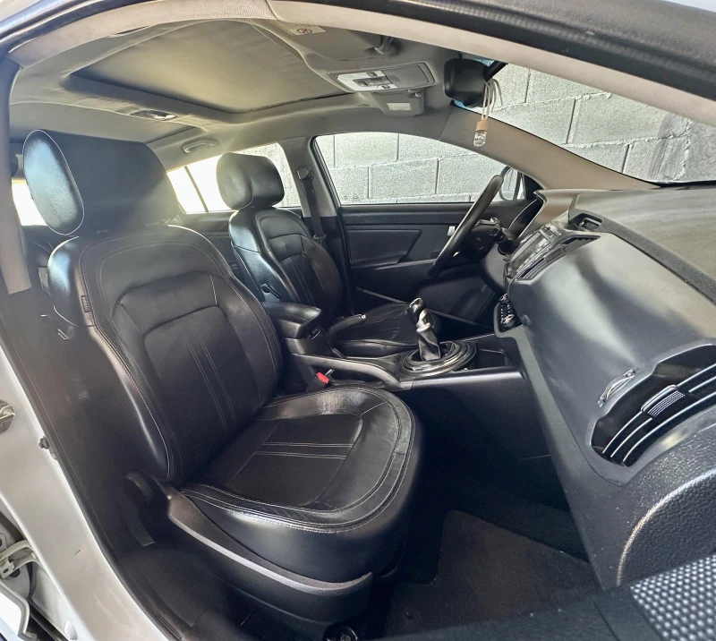 Kia Sportage 1.7 CRDi 115кс, Панорама, Кожа, Подгреви, TV, снимка 14 - Автомобили и джипове - 52465900