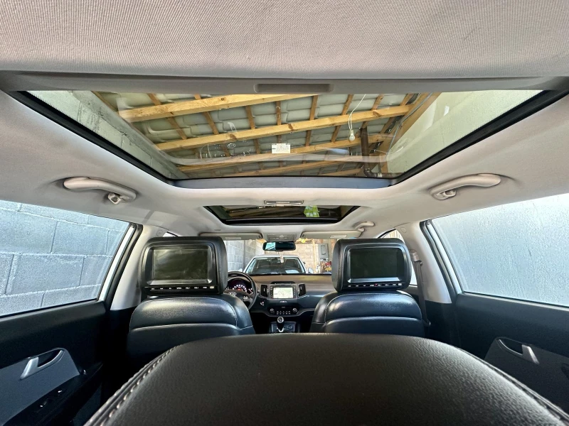 Kia Sportage 1.7 CRDi 115кс, Панорама, Кожа, Подгреви, TV, снимка 17 - Автомобили и джипове - 52465900