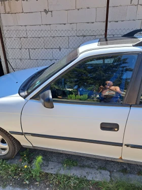 Opel Astra Комби, снимка 11