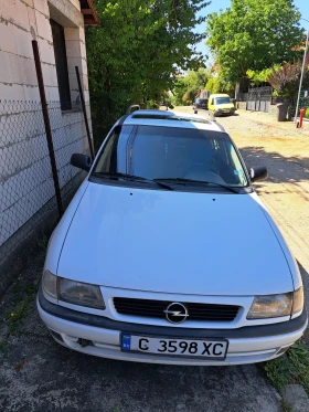 Opel Astra Комби, снимка 12