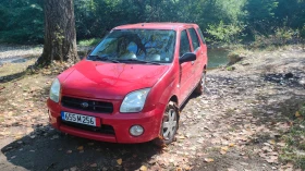 Subaru G3x justy 1.3i, 4x4, климатик , снимка 13