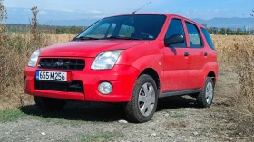 Subaru G3x justy 1.3i, 4x4, климатик , снимка 11