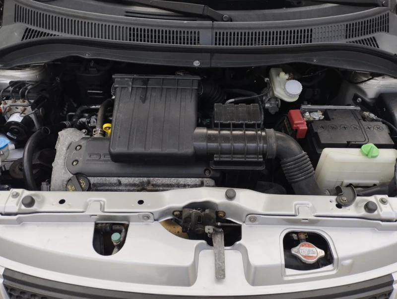 Suzuki Swift 1.3, снимка 9 - Автомобили и джипове - 52514630