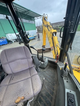 Багер New Holland LB95-4PT, снимка 8