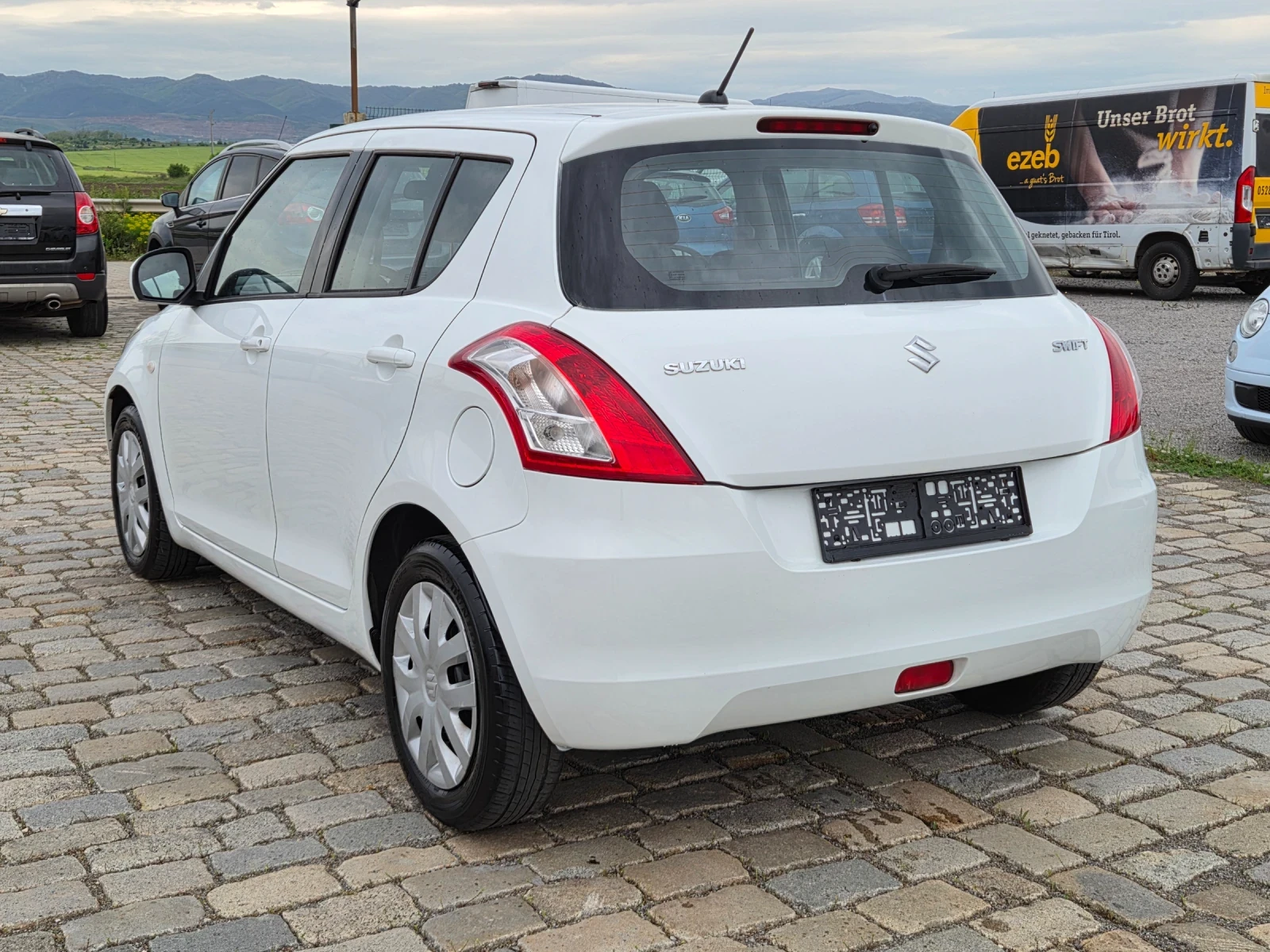Suzuki Swift 1.2i 90кс EURO 5B 12.2013, снимка 6 - Автомобили и джипове - 54473691